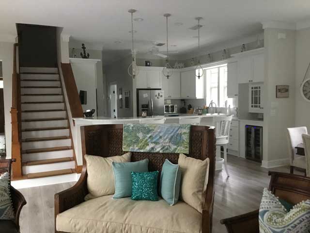 Kitchen remodel after is an open spacious design.